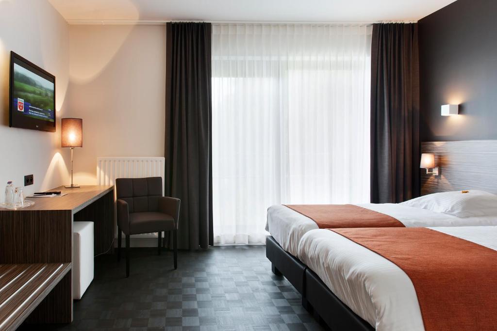 Park Hotel Montreal Mechelen Rom bilde